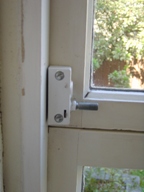 Window lock with one way screw